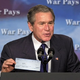 Bush entices war opponents with a $300 tax rebate.
